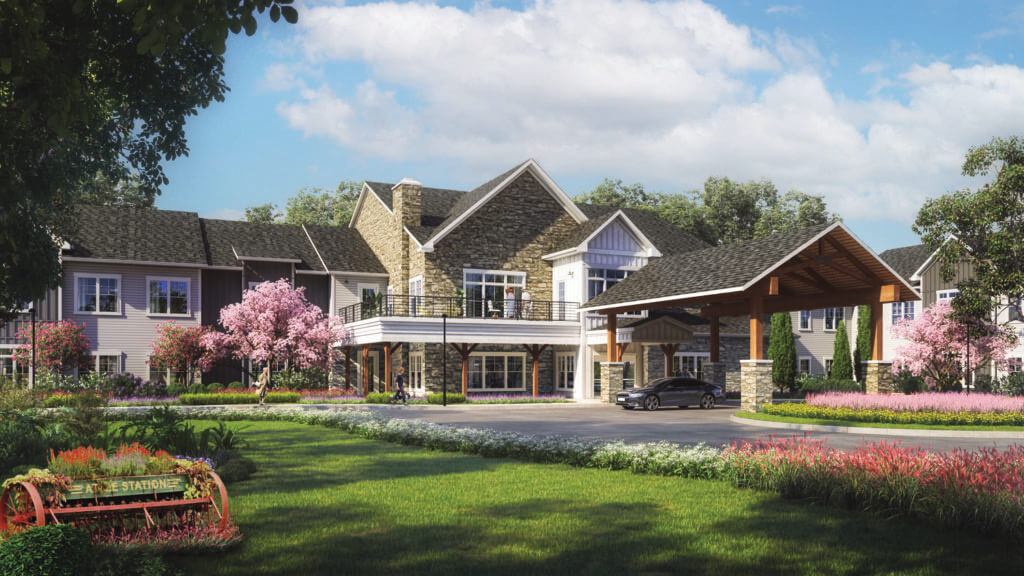 Rendering of exterior of Sancerre Atlee Station senior living community with tress and flowers in the landscape with white and stone exterior with a wooden porte-cochère in front