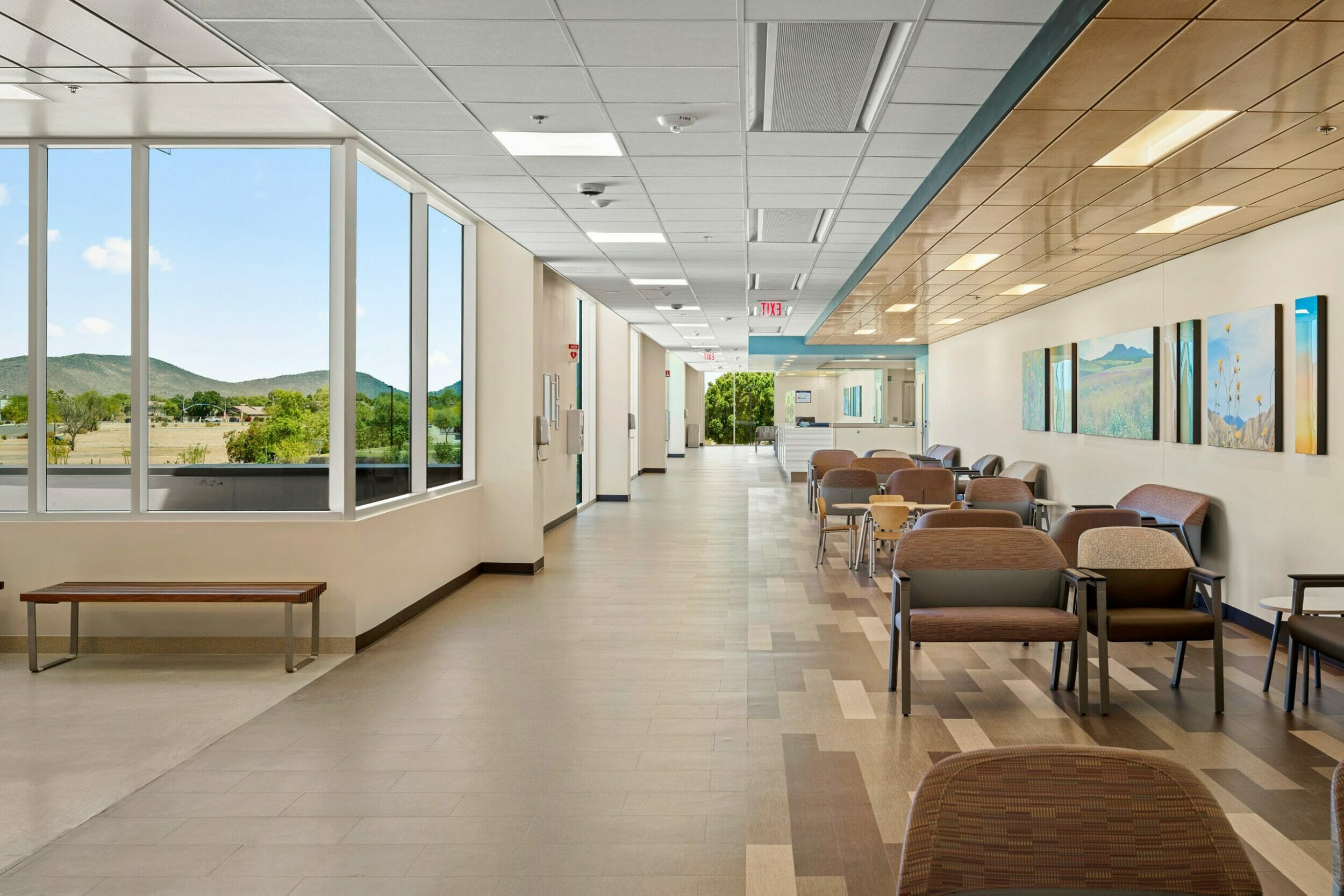 Lobby of Banner Health Center plus with mountain views, finished with light wood floors and light cream walls