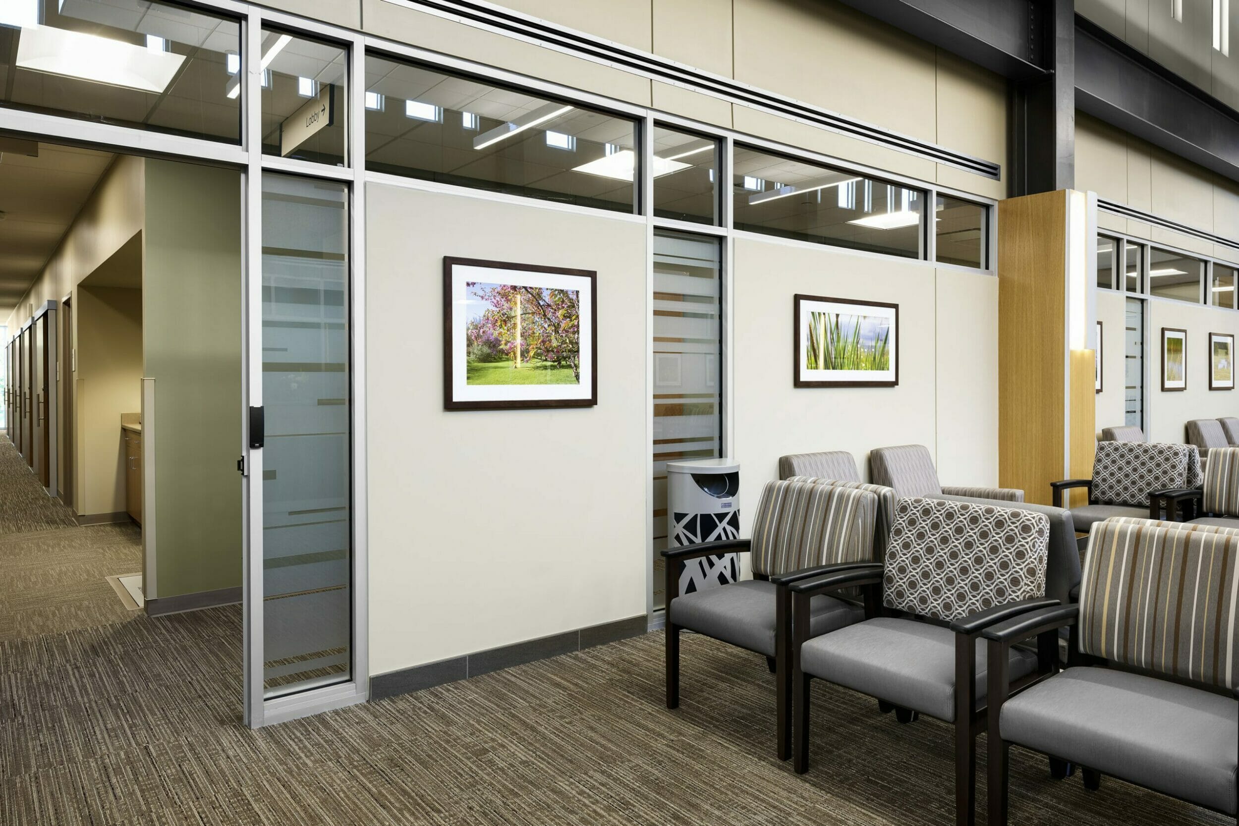lobby/waiting area seating, nature photos on wall, medical office building