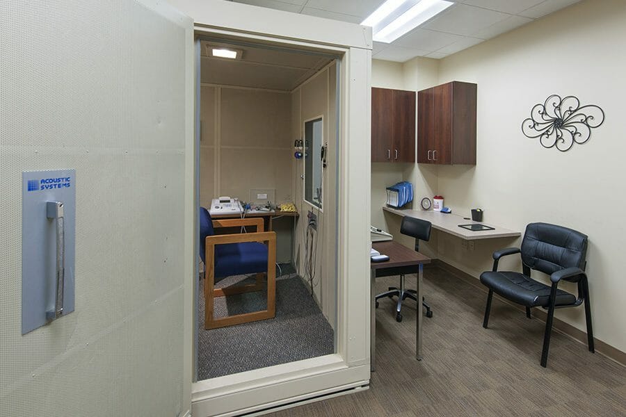 Hearing screening room with sound-proof room where patient gets their hearing tested