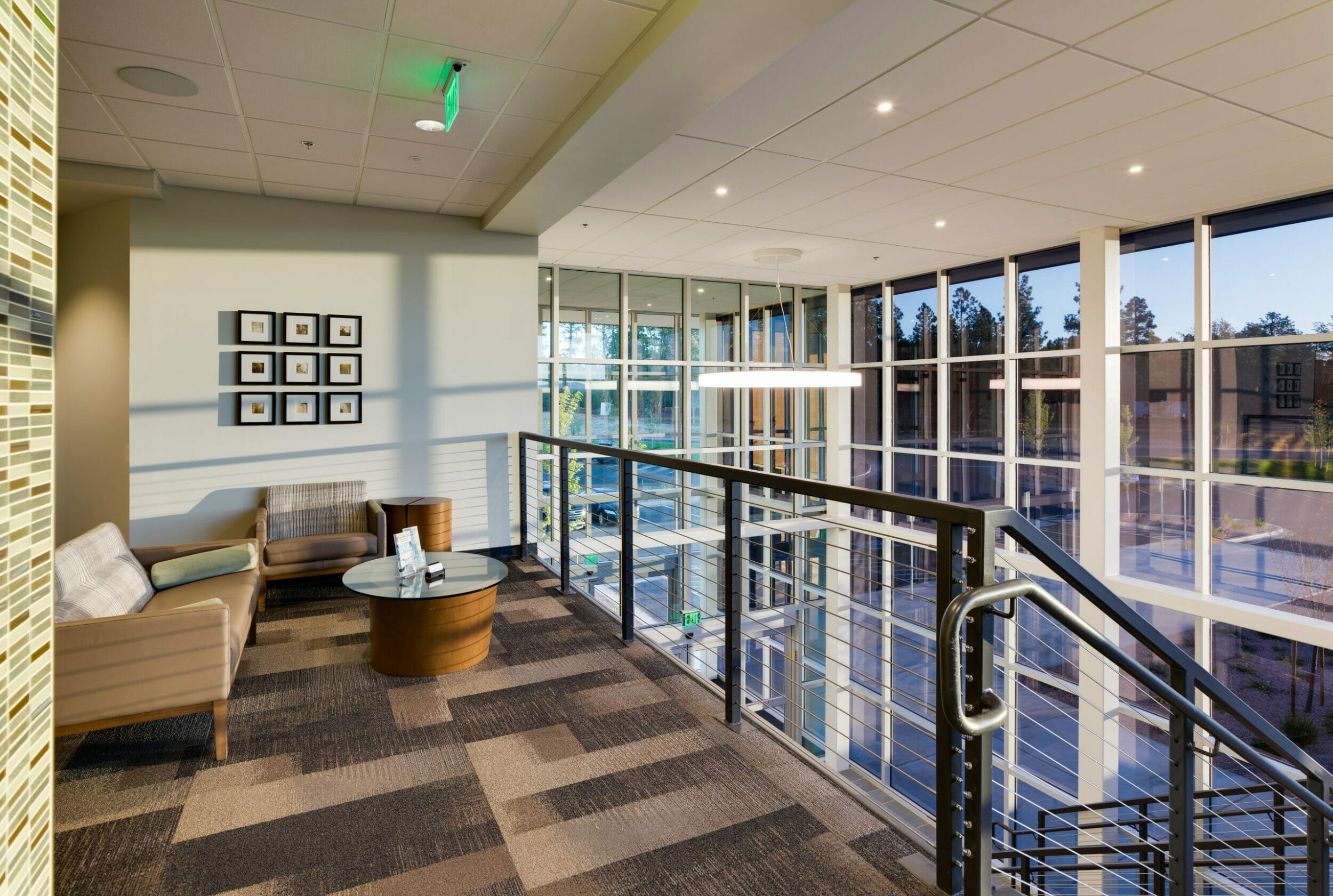 medical office building upper level seating/waiting area, open loft over looking glass atrium