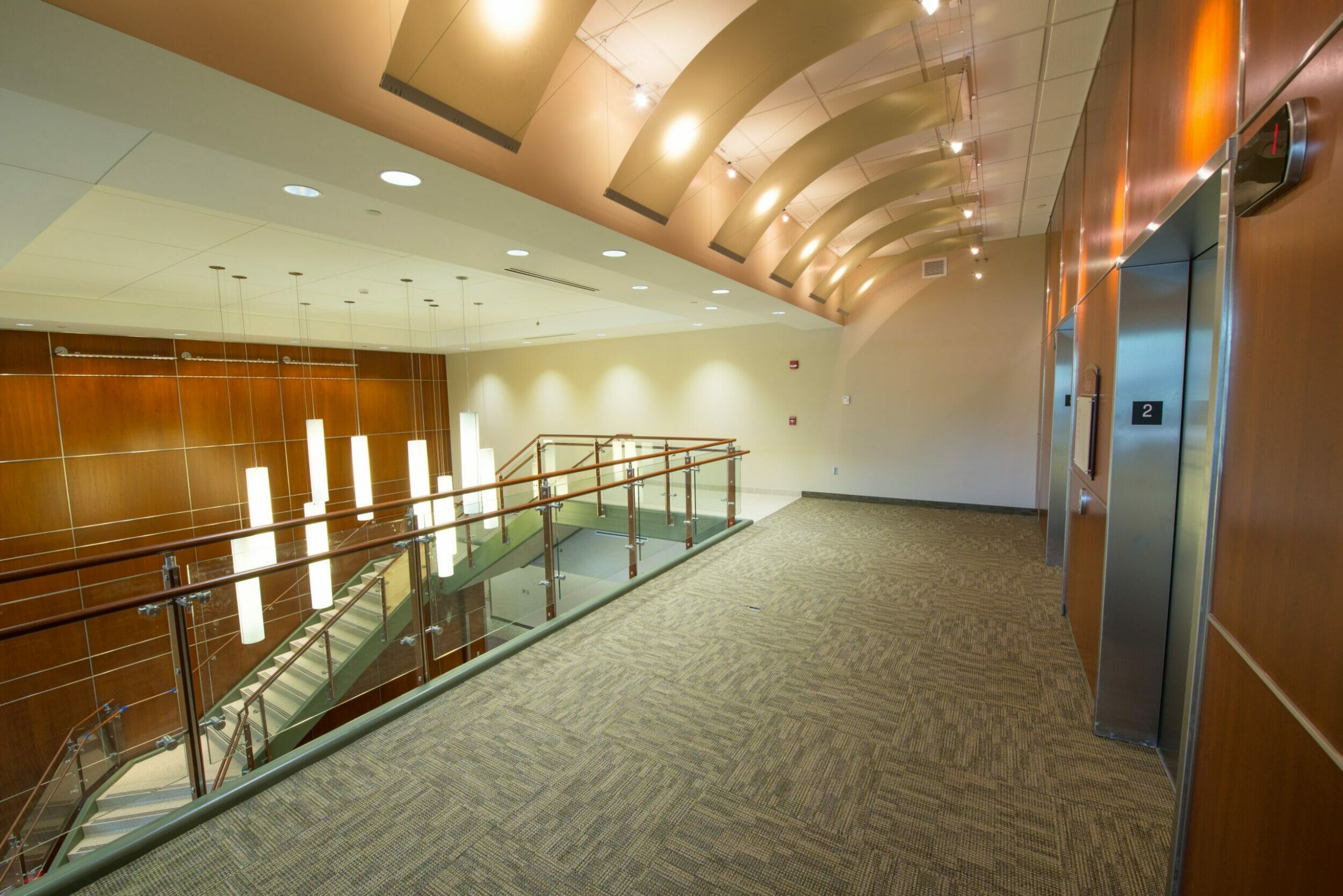 main level lobby and elevators from upper level view point