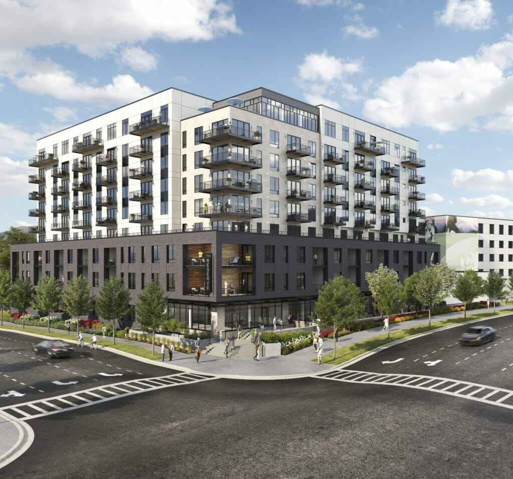Rendering of The Reserve at Lone Tree senior living with dark gray exterior on first three floors and white exterior on the top 6 floors